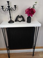 Radiator console shelf with